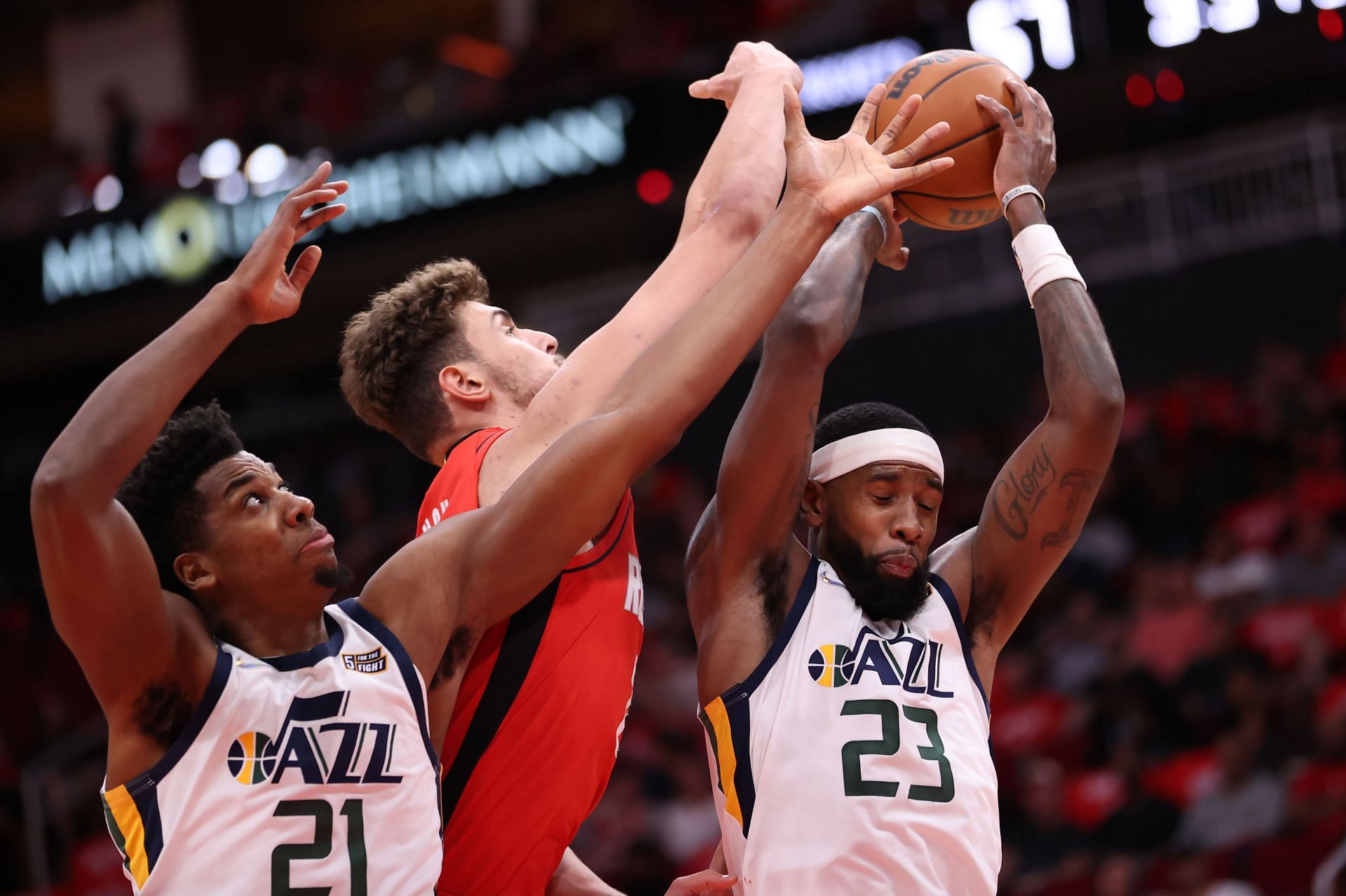 Royce O&#039;Neale secures a rebound for the Utah Jazz.