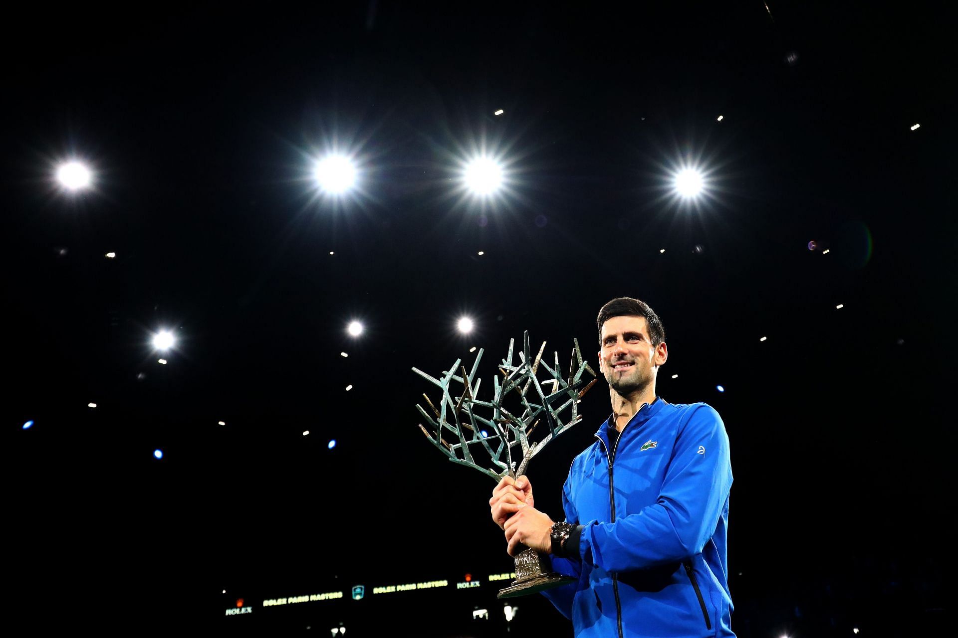 Novak Djokovic with his 2019 Rolex Paris Masters title