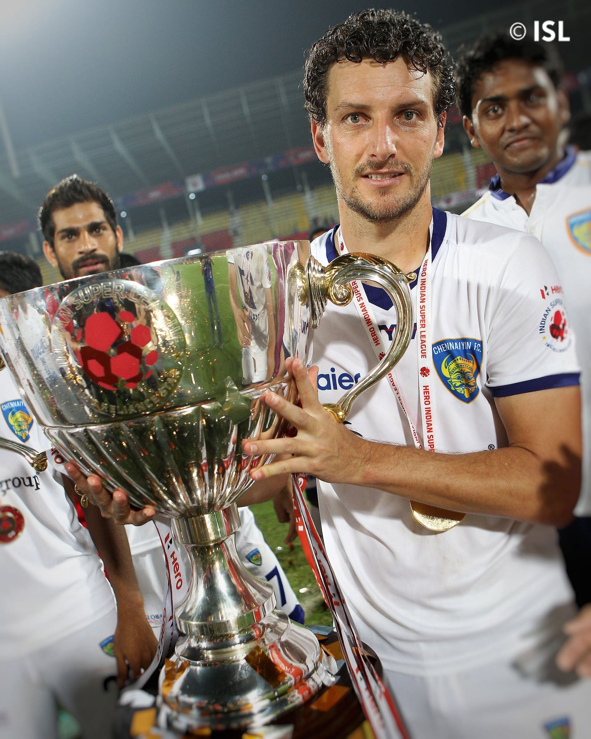 Elano Blumer of Chennaiyin FC holds up the 2015 ISL title.