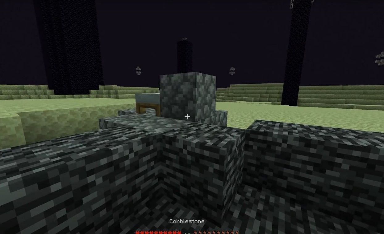 Bed with block in End Realm (Image via YouTube)