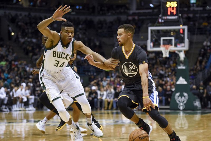 Giannis Antetokounmpo and Stephen Curry in 2016 [Source: USA Today]