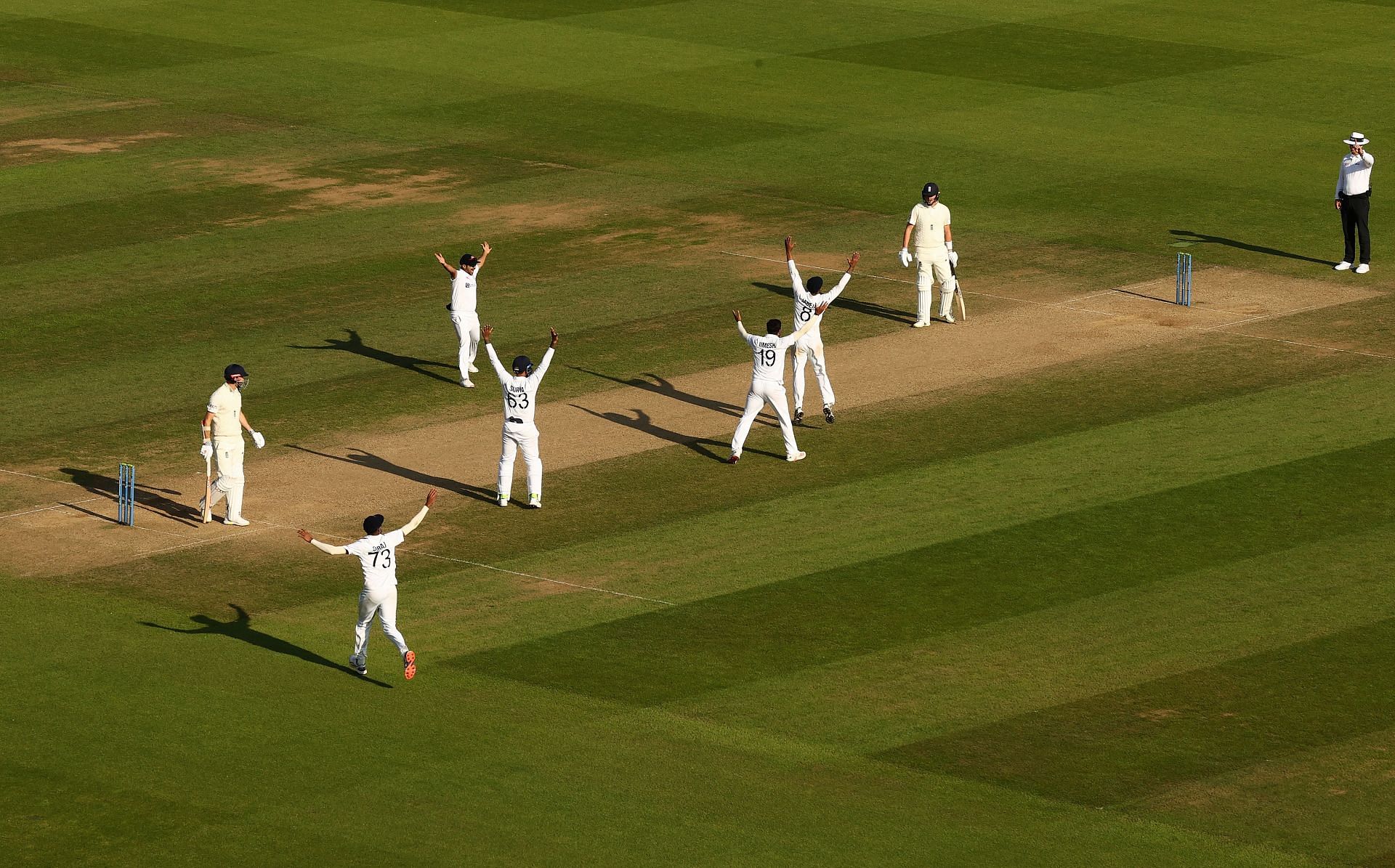 Indian team players celebrate the fall of James Anderson&#039;s wicket