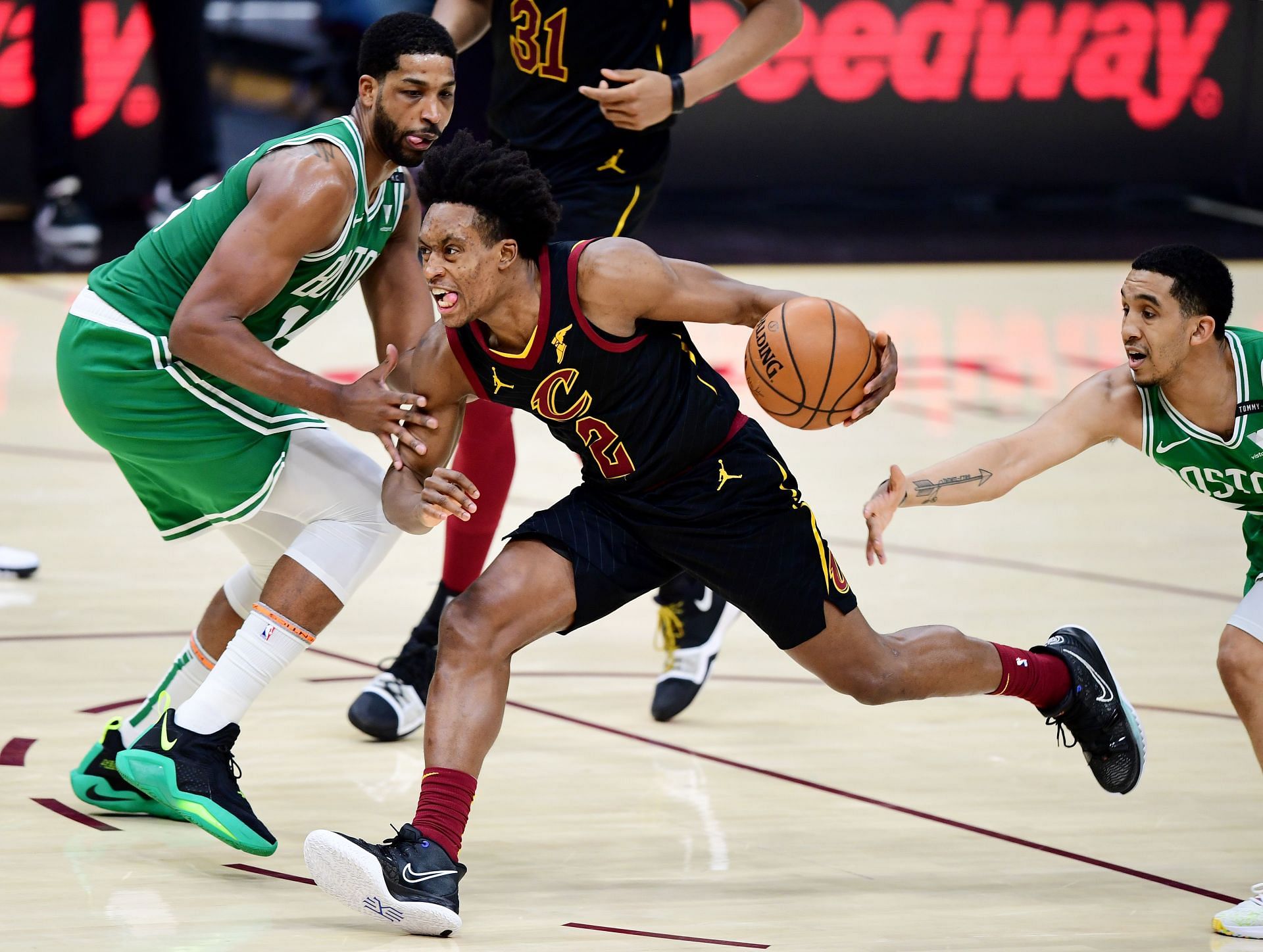 Collin Sexton driving into the paint against the Boston Celtics