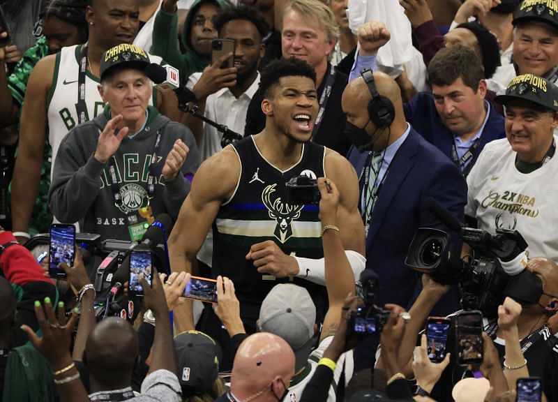 Giannis Antetokounmpo celebrates after winning the 2021 NBA Finals with the Milwaukee Bucks.