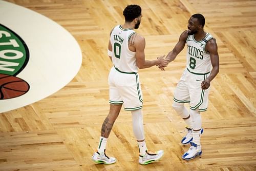 Jayson Tatum (#0) and Kemba Walker (#8) of the Boston Celtics