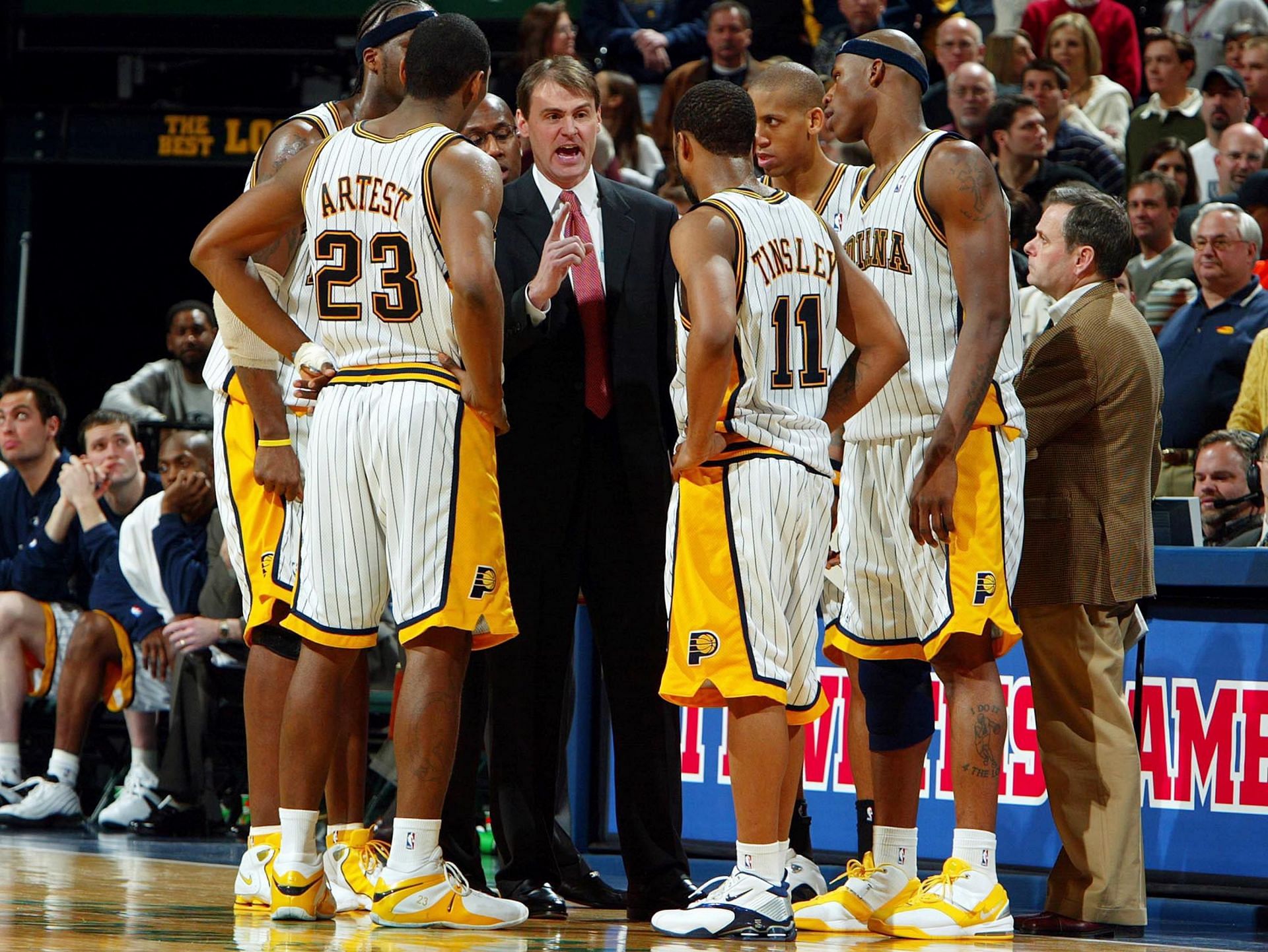 Rick Carlisle the Head Coach of the Indiana Pacerss gives instructions to his team in 2004.