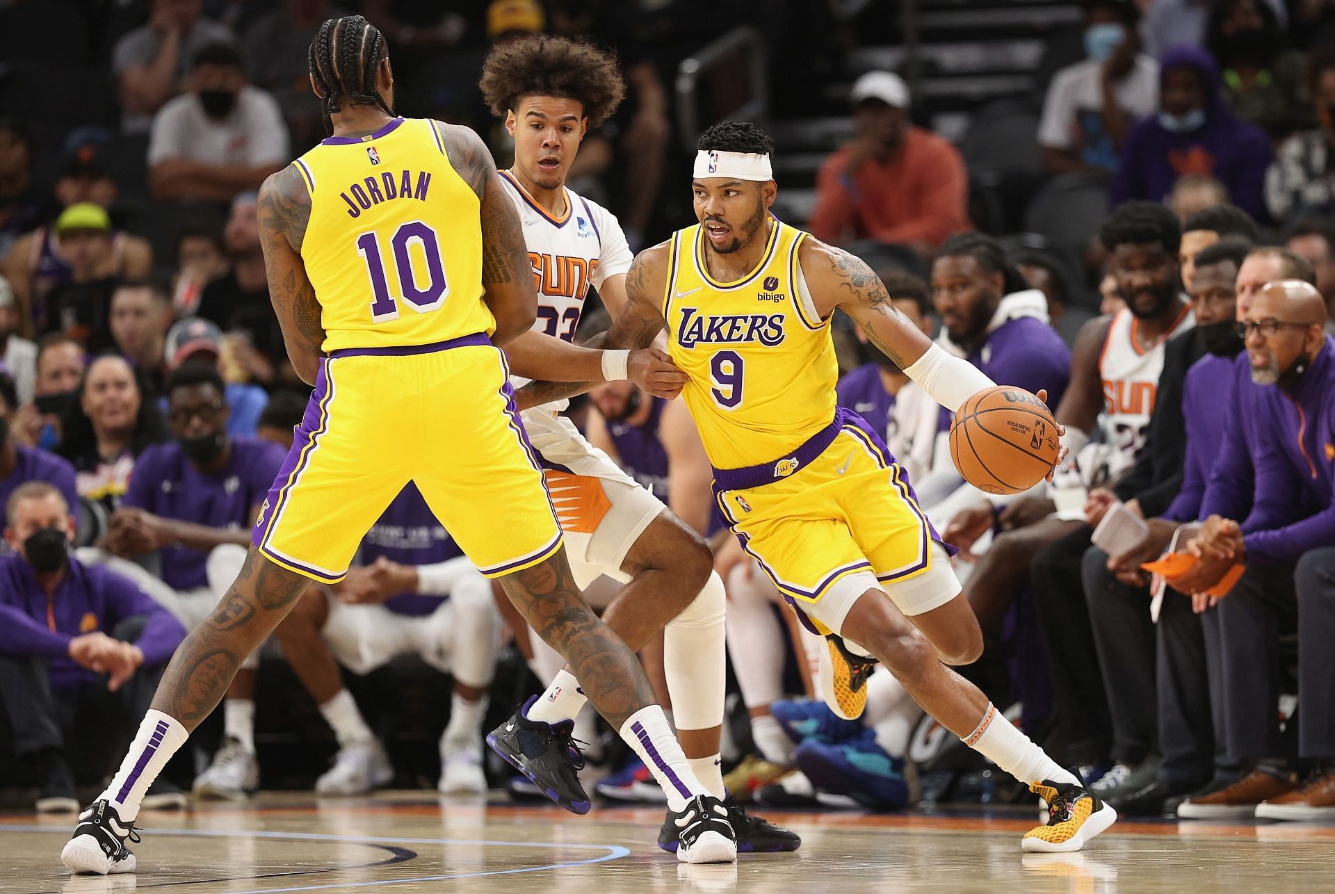 DeAndre Jordan and Kent Bazemore of LA Lakers in action against Phoenix Suns
