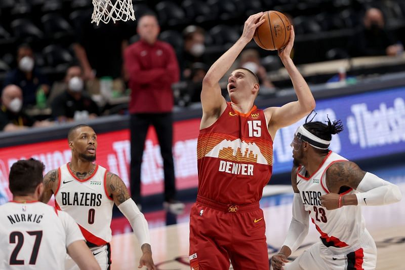 Nikola Jokic finishing at the rim against the Portland Trail Blazers