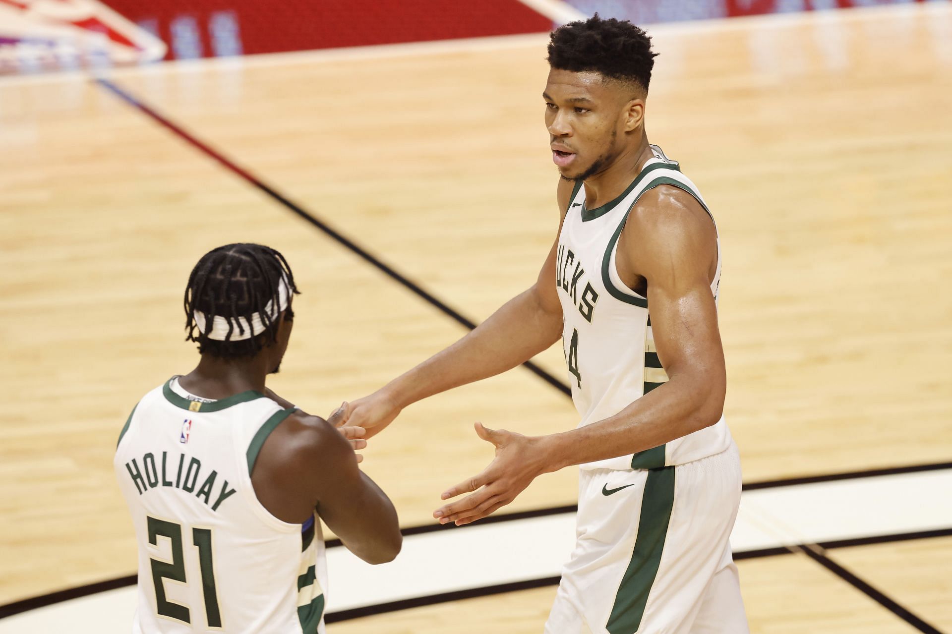 Jrue Holiday and Giannis in action for the Milwaukee Bucks