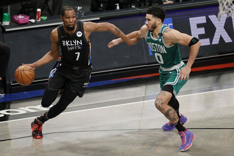Kevin Durant of the Brooklyn Nets and Jayson Tatum of the Boston Celtics going at it in the playoffs last year.