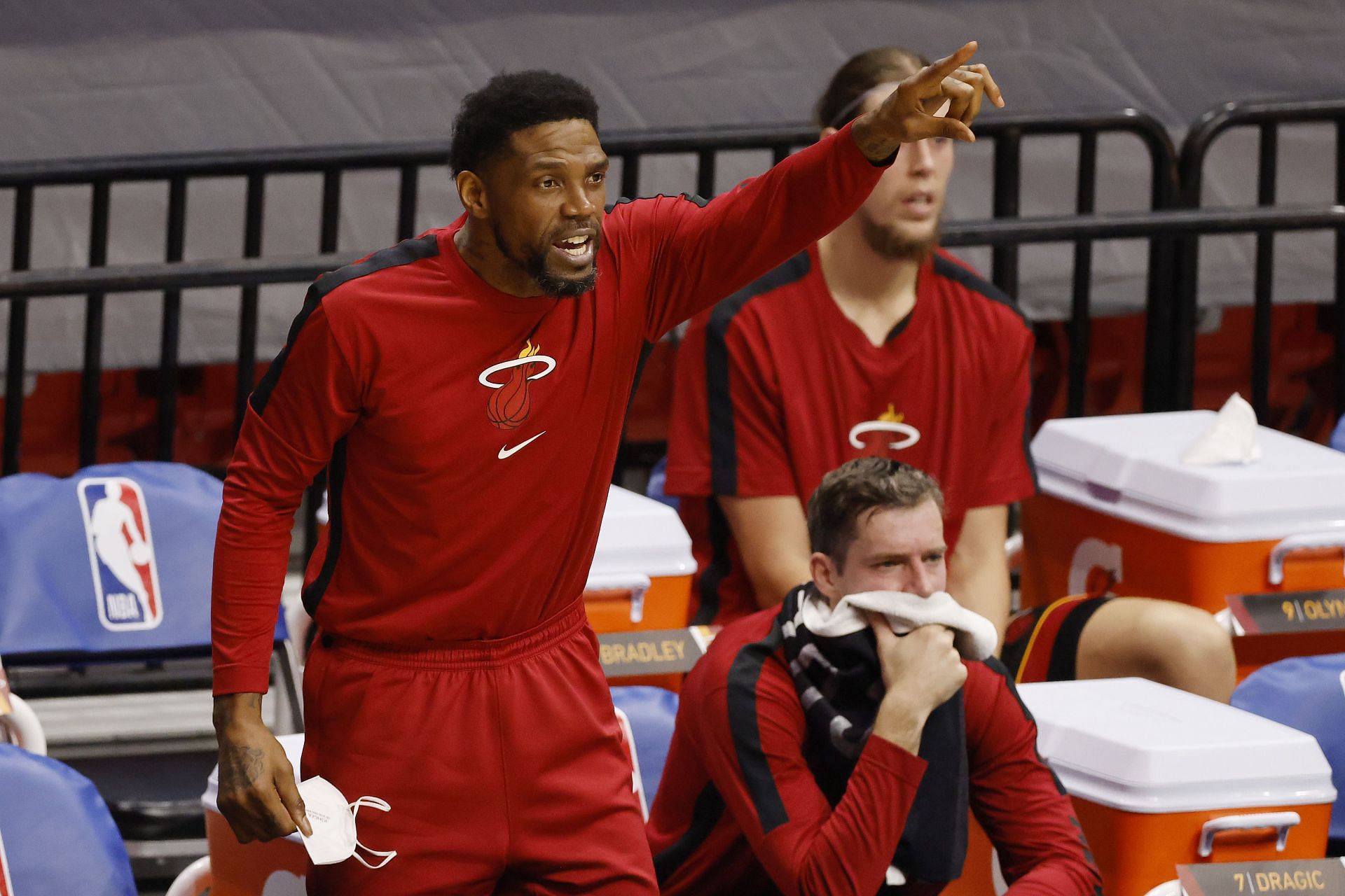Miami Heat legend Udonis Haslem shouting out instructions from the bench