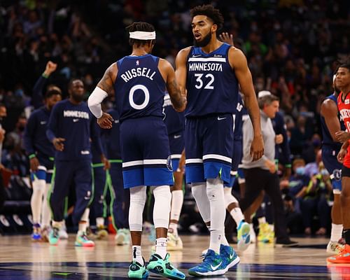 Karl-Anthony Towns (#32) and D'Angelo Russell (#0) of the Minnesota Timberwolves