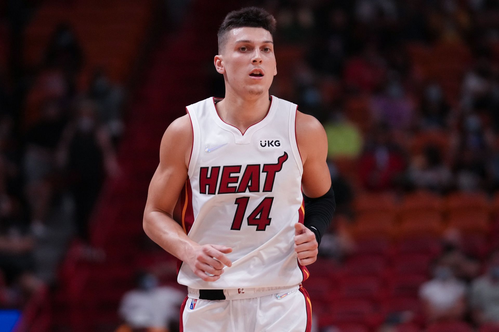 Tyler Herro #14 of the Miami Heat runs back to play defense against the Atlanta Hawks in the third quarter of preseason action at FTX Arena on October 04, 2021 in Miami, Florida.