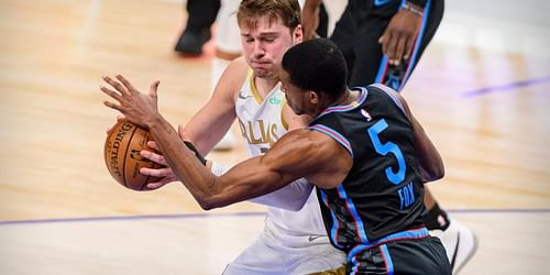 De'Aaron Fox of the Sacramento Kings guarding Dallas Mavericks' Luka Doncic [Source: USA Today]