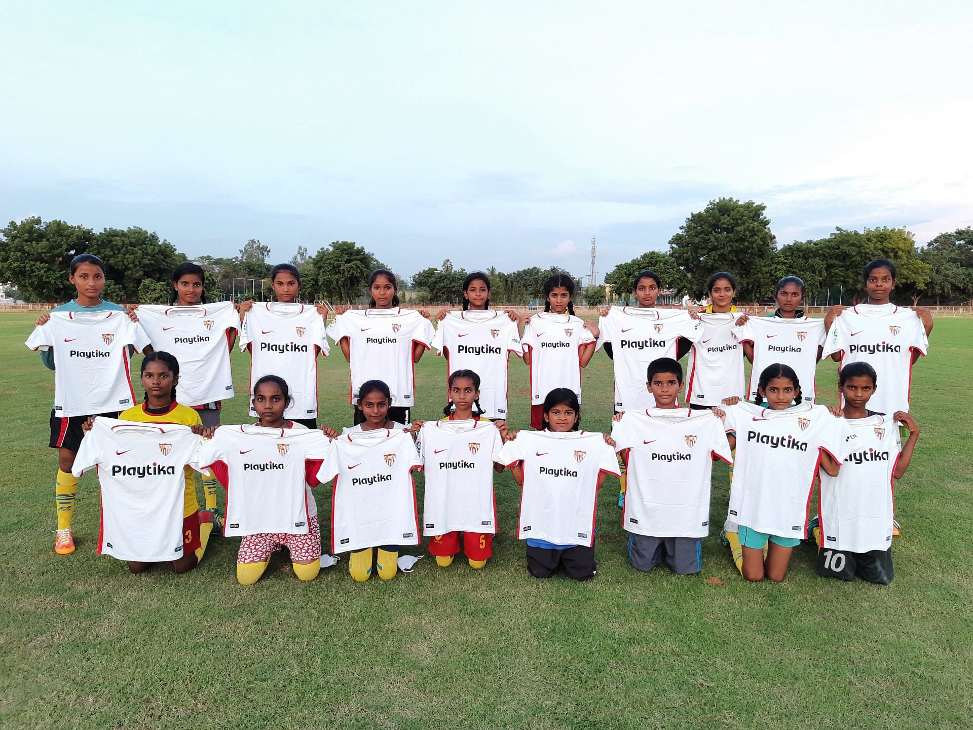 Official Sevilla FC jerseys in the Anantapur Rural Football League.