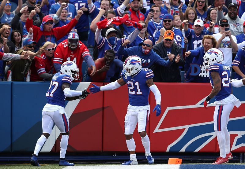 Members of the Buffalo Bills secondary celebrate an interception