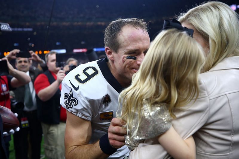 New Orleans Saints QB Drew Brees and his family on the field
