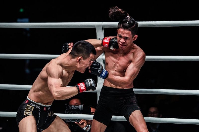 Miao Li Tao (left) looks to avenge his defeat against Jeremy Miado (right)