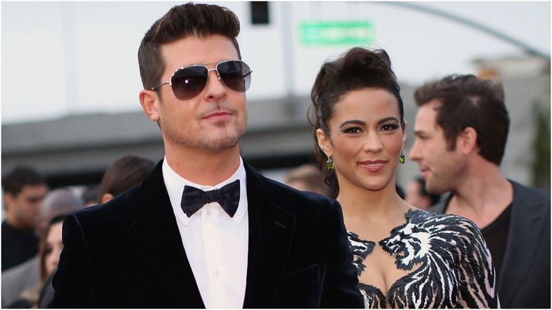Robin Thicke and actress Paula Patton attend the 56th GRAMMY Awards at Staples Center. (Image via Getty Images)