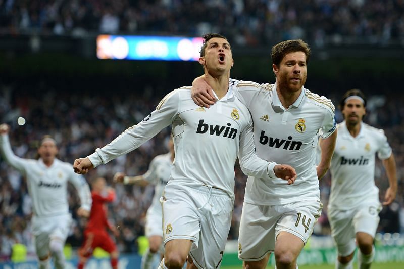 Xabi Alonso (right) had a successful stint at Real Madrid with Cristiano Ronaldo
