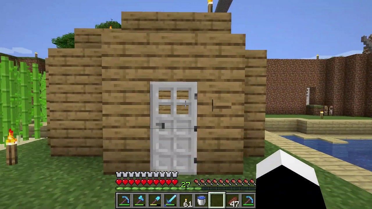 Iron doors are good for reinforcing and keeping a house safer (Image via Minecraft)