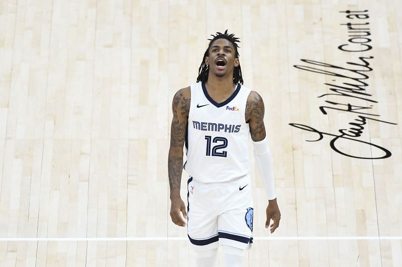 Ja Morant #12 of the Memphis Grizzlies reacts to a three-point play in Game Five of the Western Conference first-round playoff series against the Utah Jazz at Vivint Smart Home Arena on June 2, 2021 in Salt Lake City, Utah.