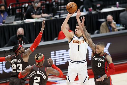 Denver Nuggets young star Michael Porter Jr. shooting over defenders