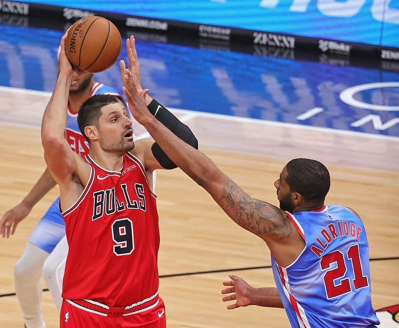 Chicago Bulls center Nikola Vucevic #9 taking a jumper