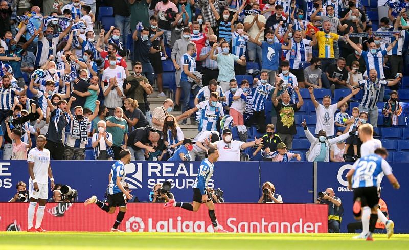 Espanyol players celebrate after scoring against Real Madrid.