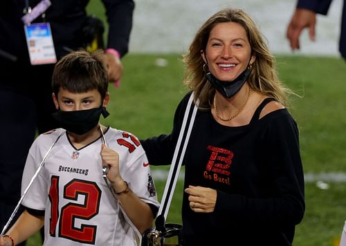 Gisele Bündchen, and son, celebrating Super Bowl LV