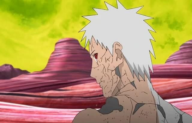 Obito crumbles away as a result of Kaguya&rsquo;s Kekkei Genkai, but encourages Naruto to finish his journey, before dying (Image via Studio Pierrot)