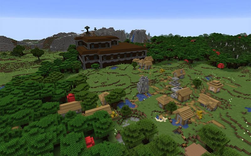 An image of a woodland mansion overlooking a village in Minecraft. (Image via Mojang).