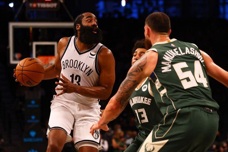 James Harden #13 of the Brooklyn Nets drives to the net against the Milwaukee Bucks at Barclays Center on October 08, 2021 in New York City.
