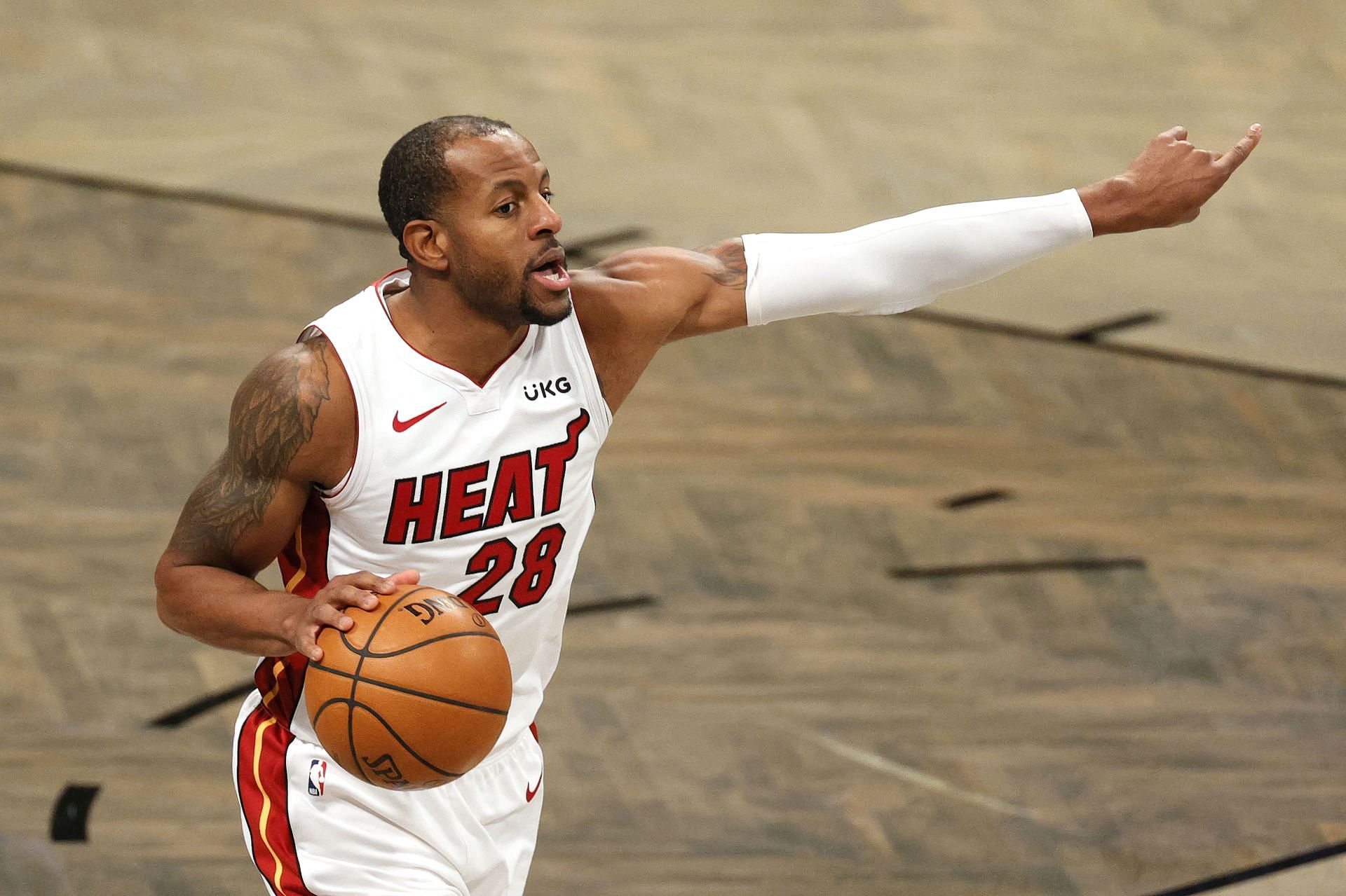 Andre Iguodala #28 of the Miami Heat dribbles the ball during the first half against the Brooklyn Nets at Barclays Center on January 25, 2021 in the Brooklyn borough of New York City.