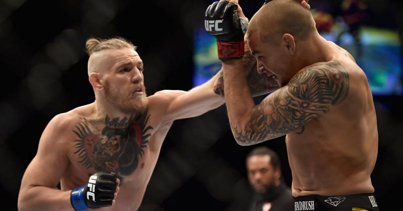 Conor McGregor shows off his braids in the fight against Dustin Poirier at UFC 178