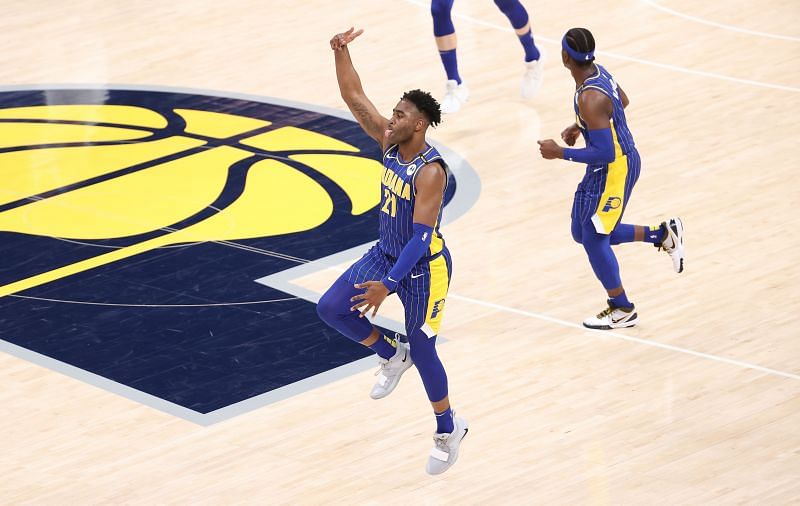 Kelan Martin #21 of the Indiana Pacers celebrates against the Charlotte Hornets