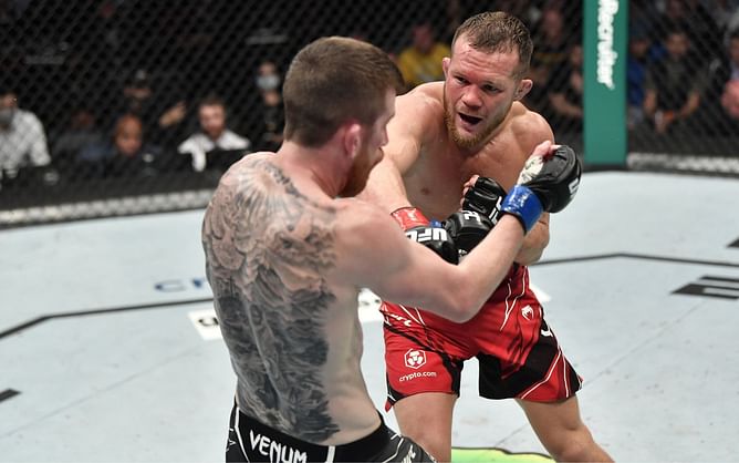 "Did we just watch the greatest title fight of all time?" - Aljamain Sterling, Michael Chandler, Paddy Pimblett and more react to the striking war between Petr Yan and Cory Sandhagen at UFC 267
