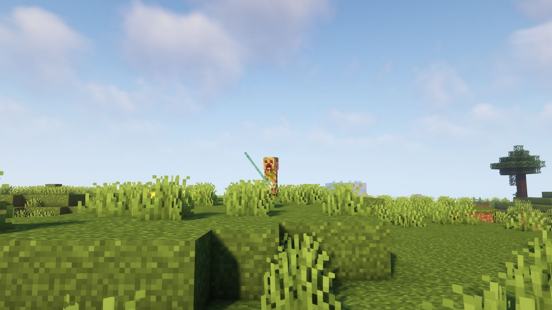 Attacking a creeper with a trident (Image via Minecraft)