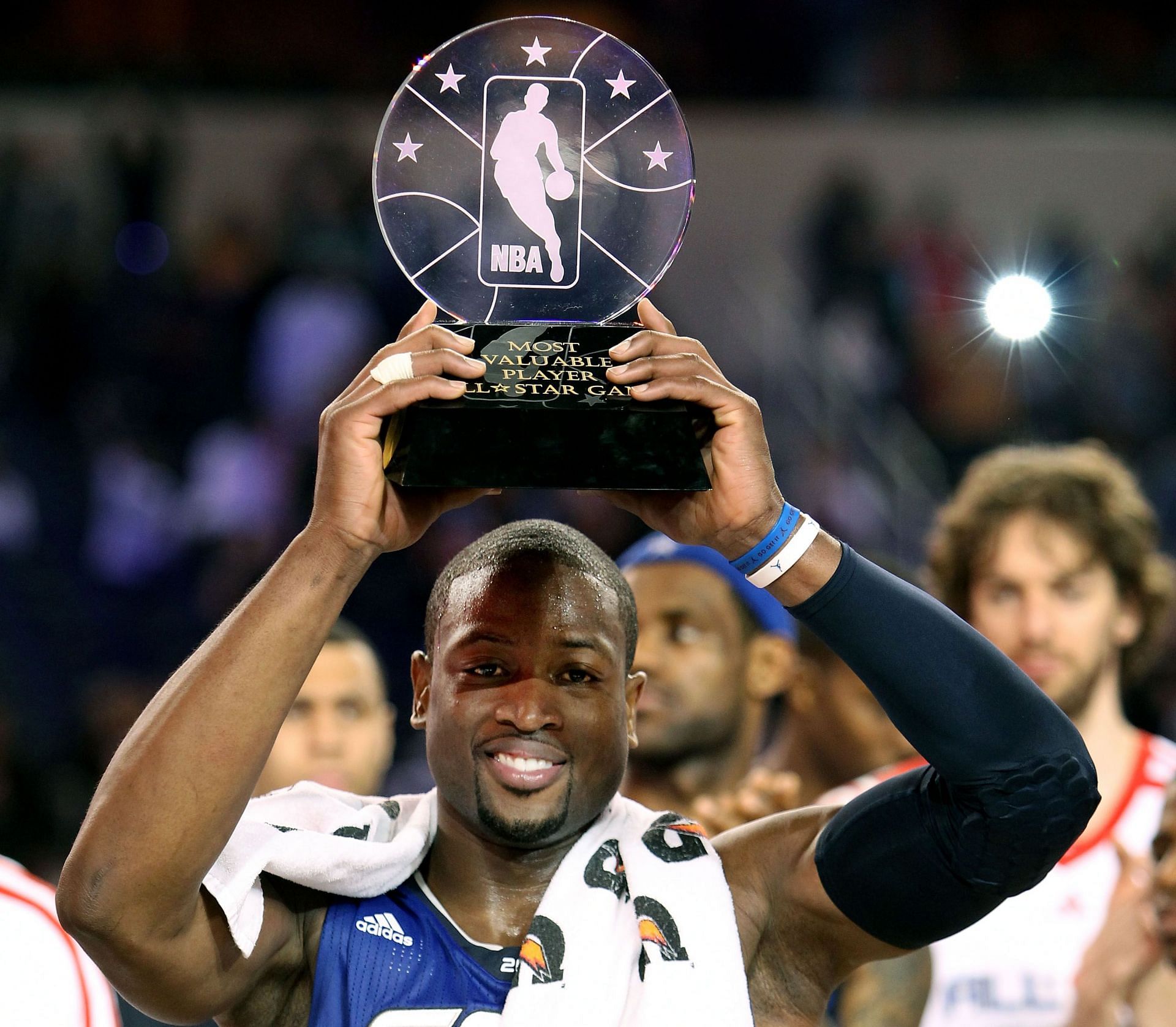 Dwyane Wade #3 of the Eastern Conference celebrates with the trophy after being named the MVP of the NBA All-Star Game, part of 2010 NBA All-Star Weekend at Cowboys Stadium on February 14, 2010 in Arlington, Texas.