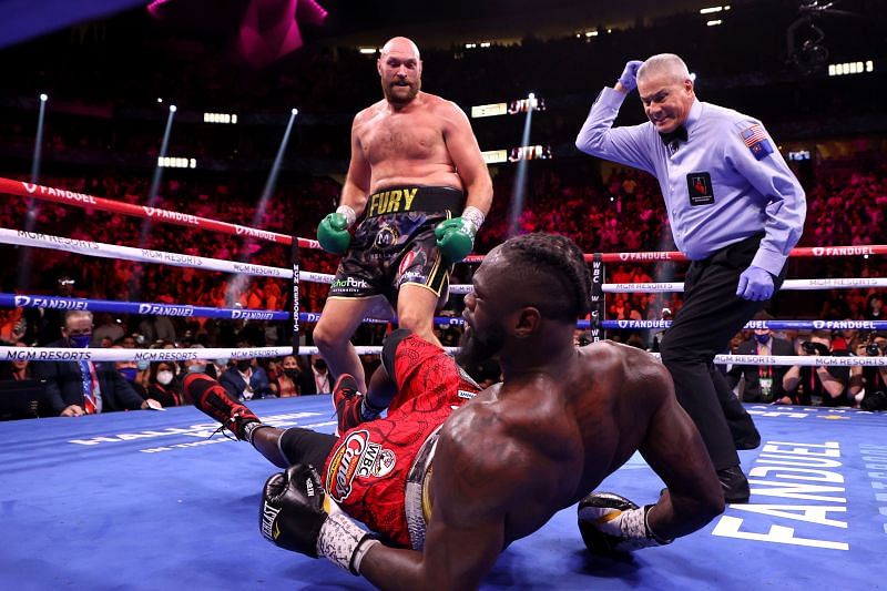 Heavyweight world champ Tyson Fury knocks down Deontay Wilder
