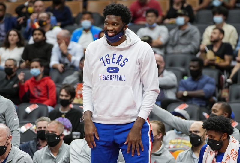 Joel Embiid (#21) of the Philadelphia 76ers sits out of a preseason game against the Toronto Raptors.