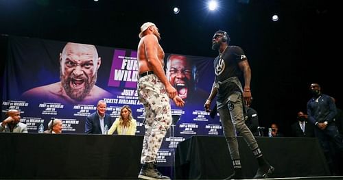 Heavyweight boxers Tyson Fury (left) and Deontay Wilder (right) face off during the press conference