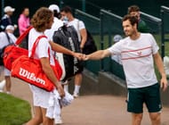 Stefanos Tsitsipas (L) and Andy Murray at Wimbledon 2021