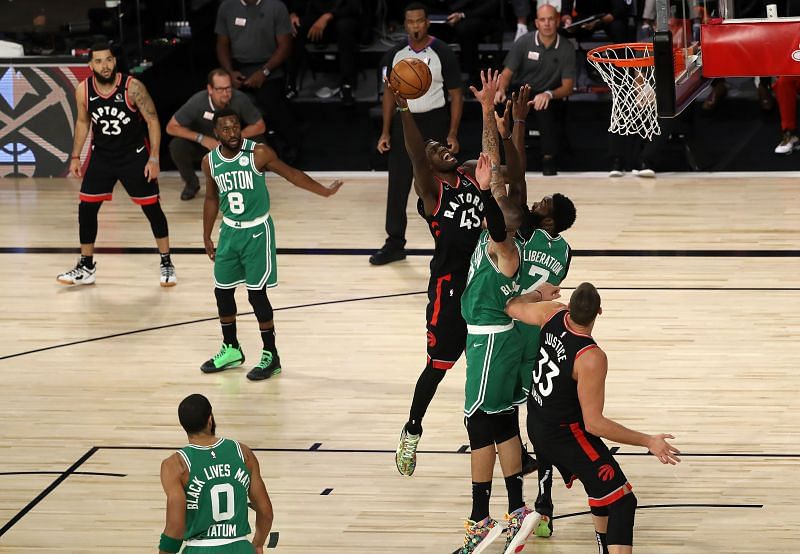 Pascal Siakam of the Toronto Raptors goes hard for a short jumper against the Boston Celtics.