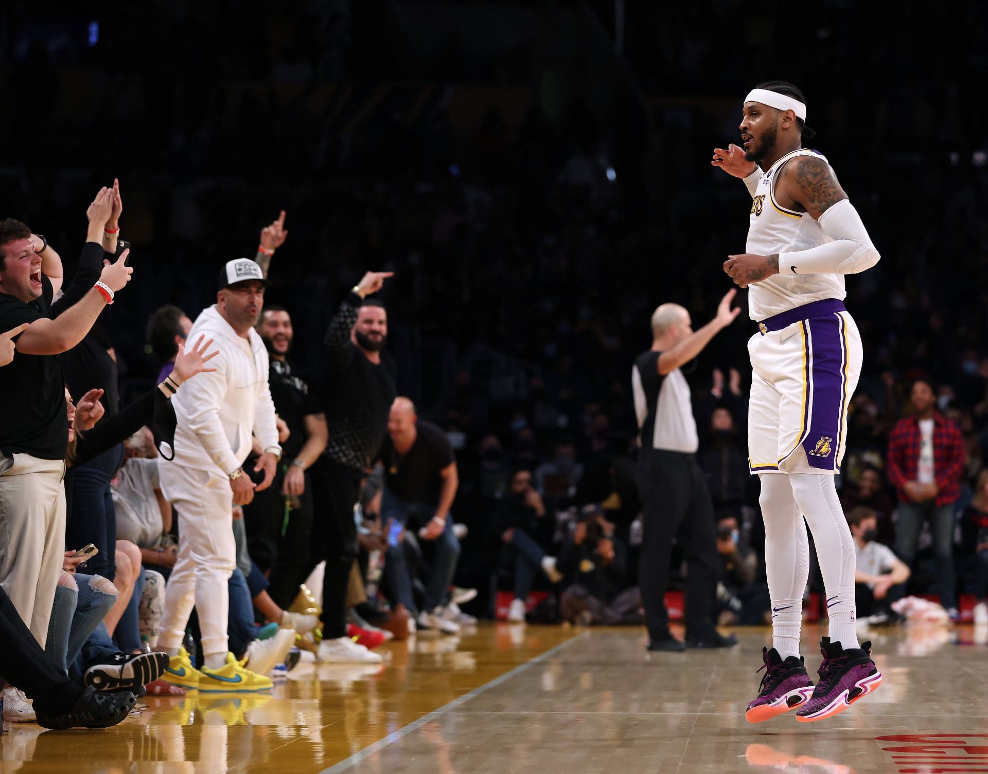 Carmelo Anthony celebrates after making a 3-point field goal.