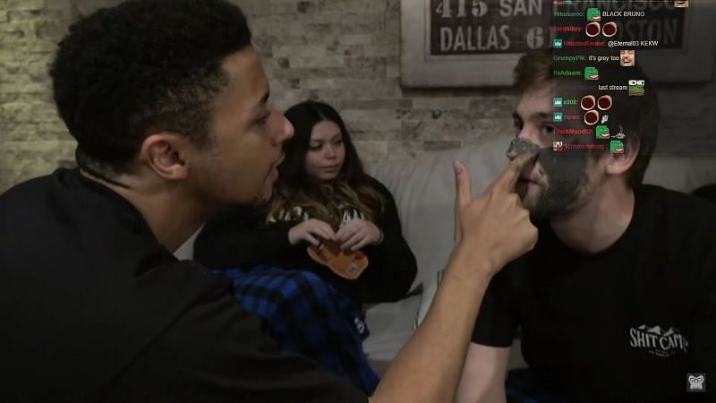 TSM Myth applying a face mask on Sodapoppin with Adept in the background (Image via xQcOW on YouTube)