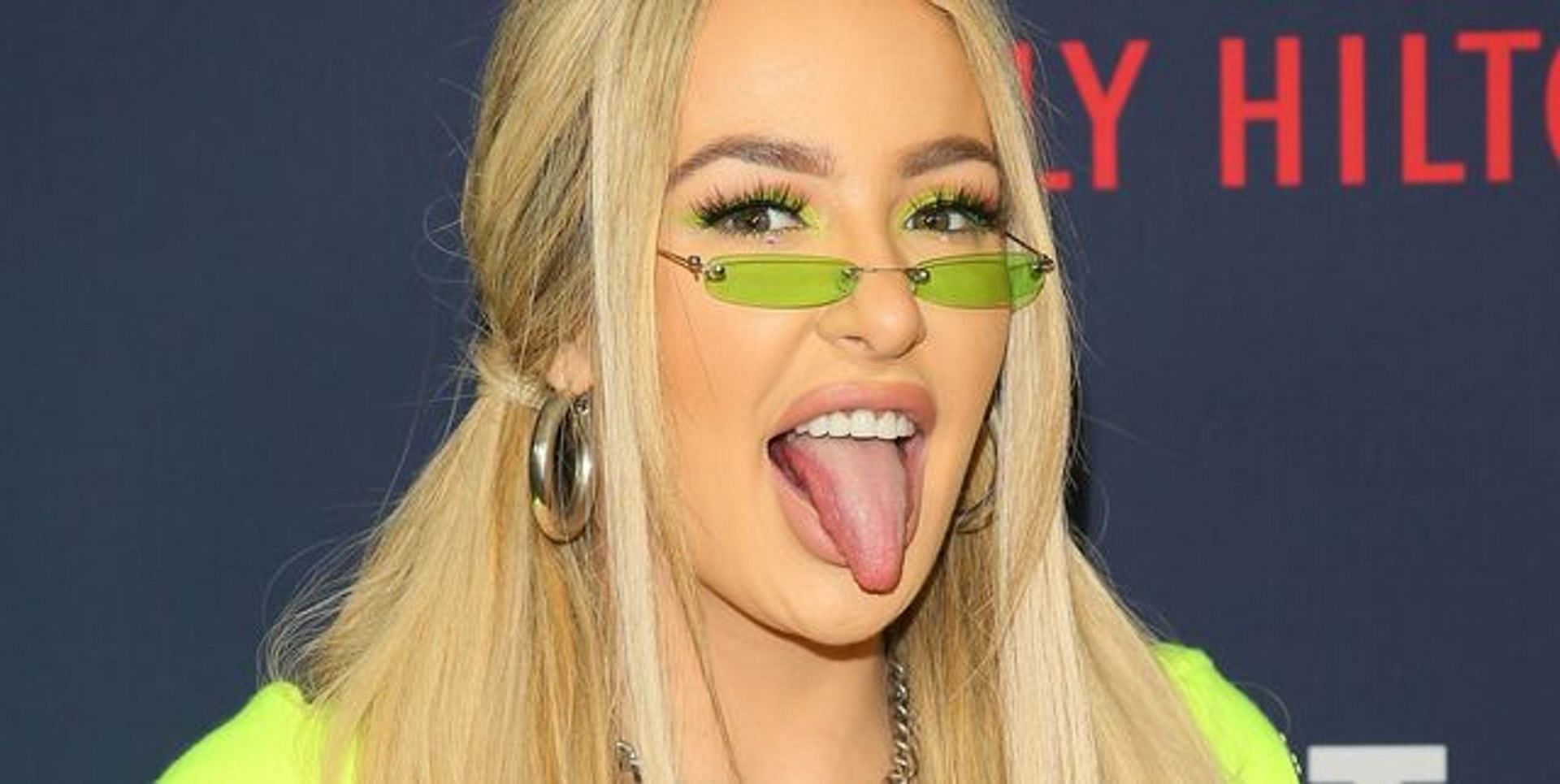 Tana Mongeau under fire for her phone wallpaper (Image via Getty Images)