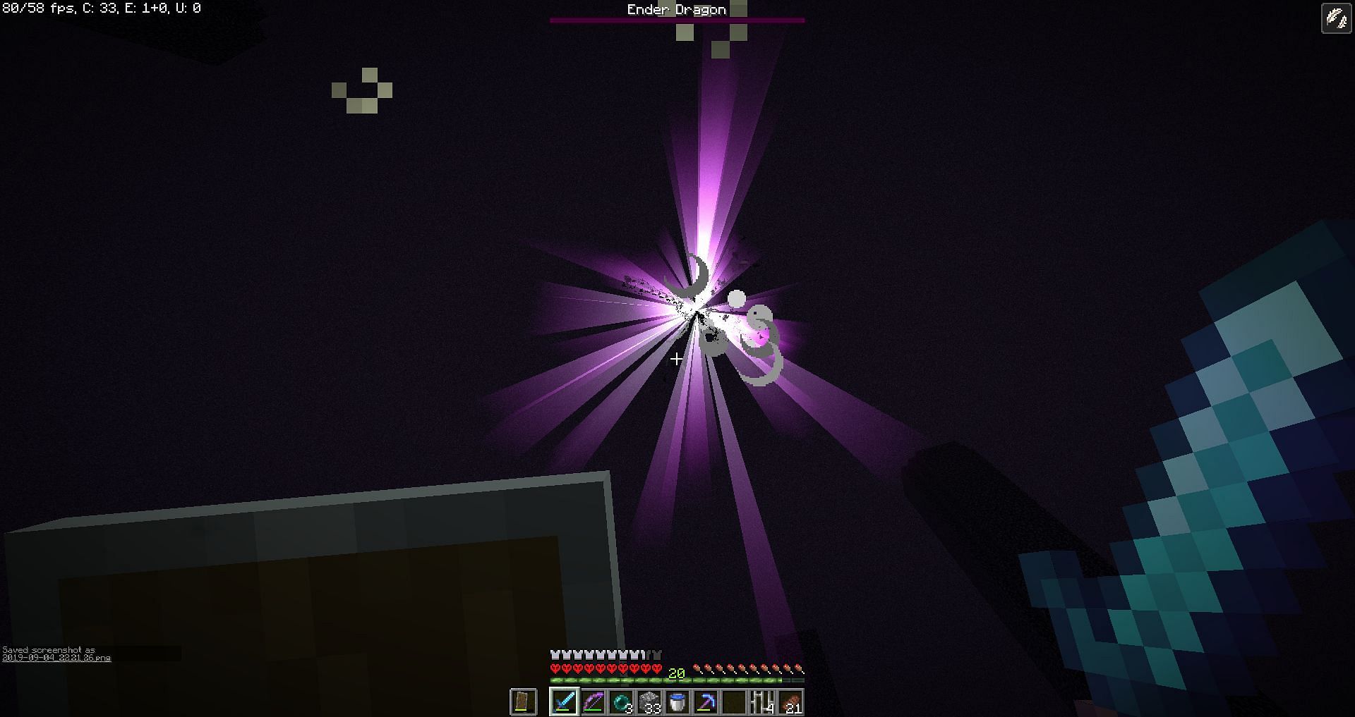 Defeating the Ender dragon (Image via Minecraft)