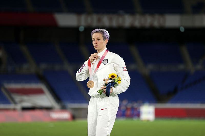 Megan Rapinoe with a bronze medal at the Japen Olympics