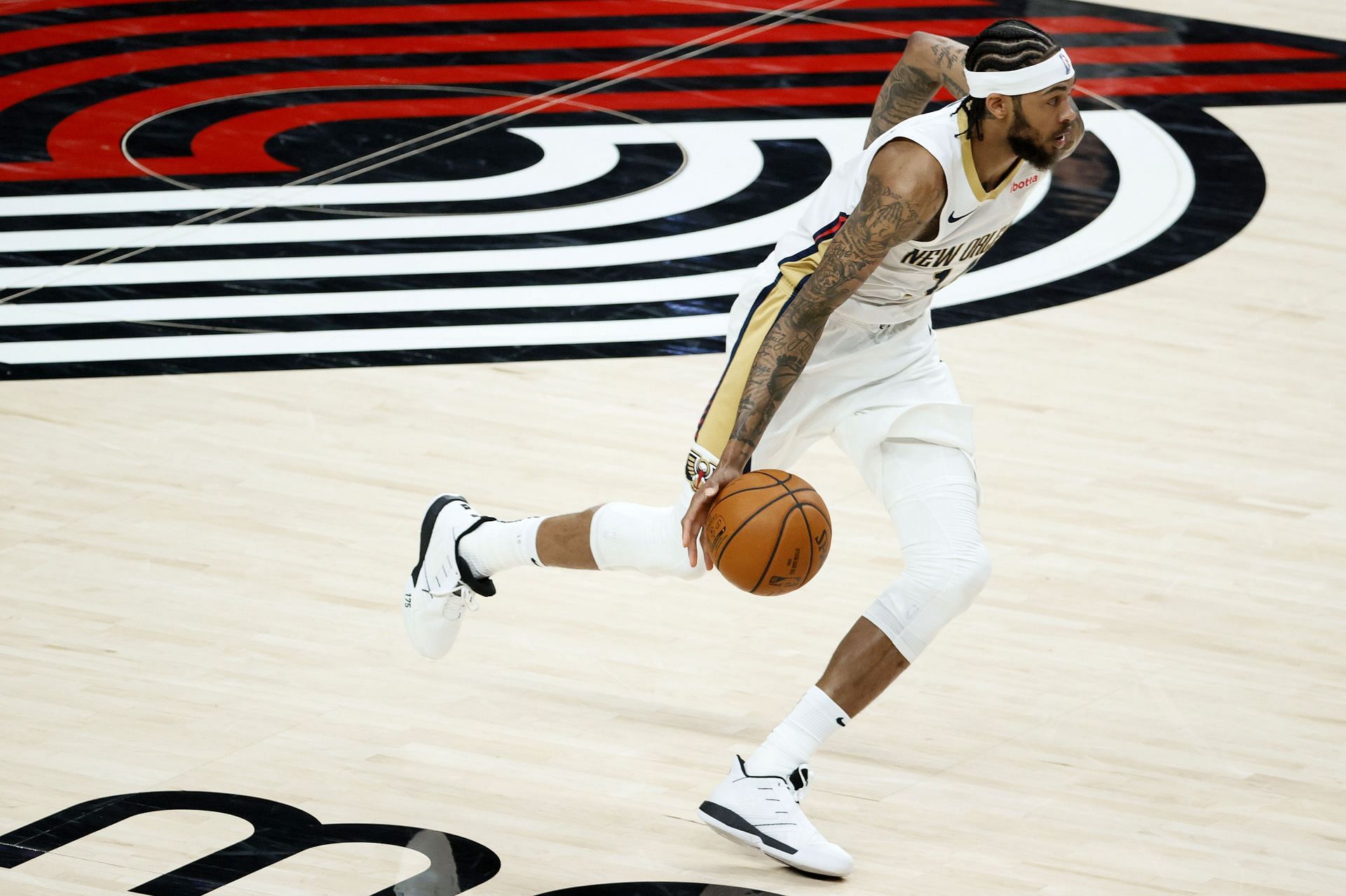 Brandon Ingram #14 of the New Orleans Pelicans in action against the Portland Trail Blazers during the second quarter at Moda Center on March 18, 2021 in Portland, Oregon.